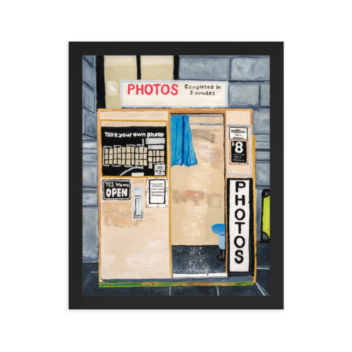 A framed print of Flinders Street photo booth, 11x14, black.