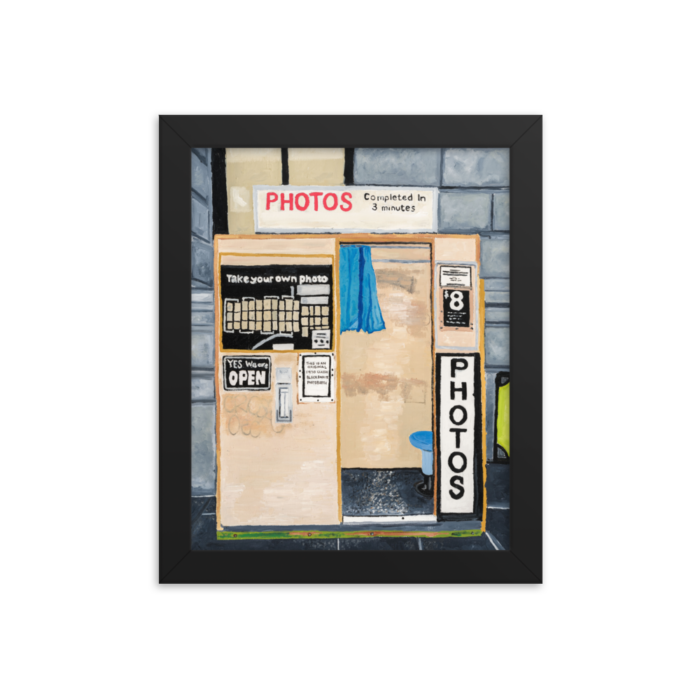 A framed print of Flinders Street photo booth, 8 x 10, black.