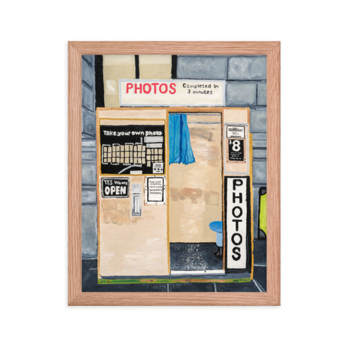 A framed print of Flinders Street photo booth, 11x14, red oak.