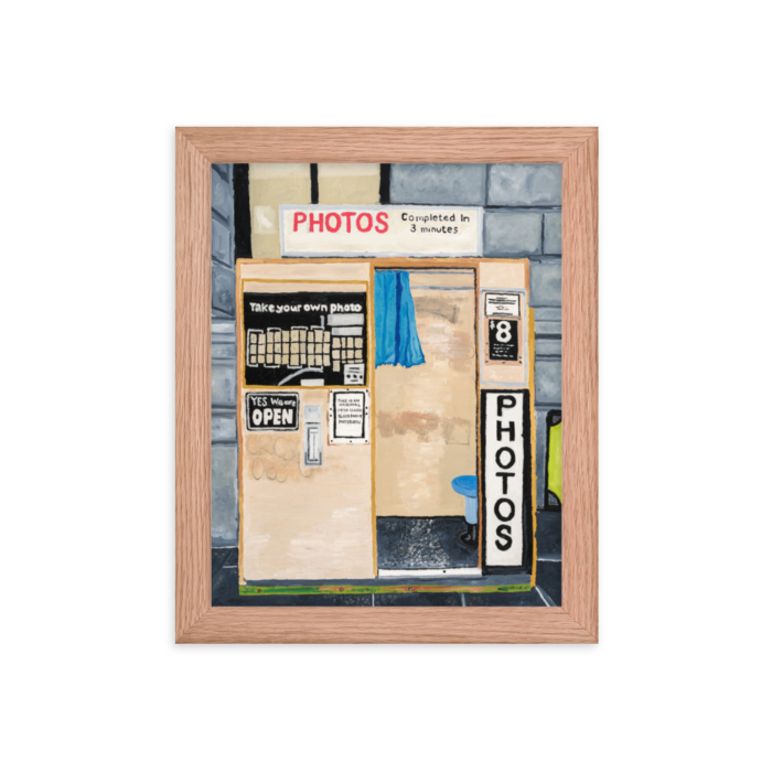 A framed print of Flinders Street photo booth, 8x10, red oak.